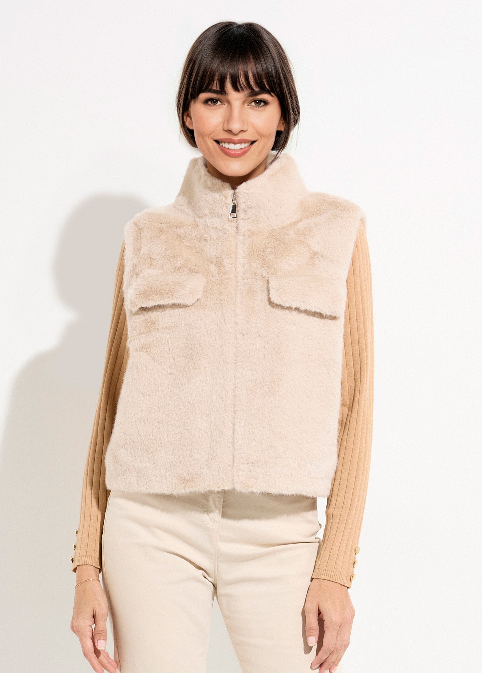 Blouson_zippé_sans_manches_en_fourrure_Ecru_FA1_slim