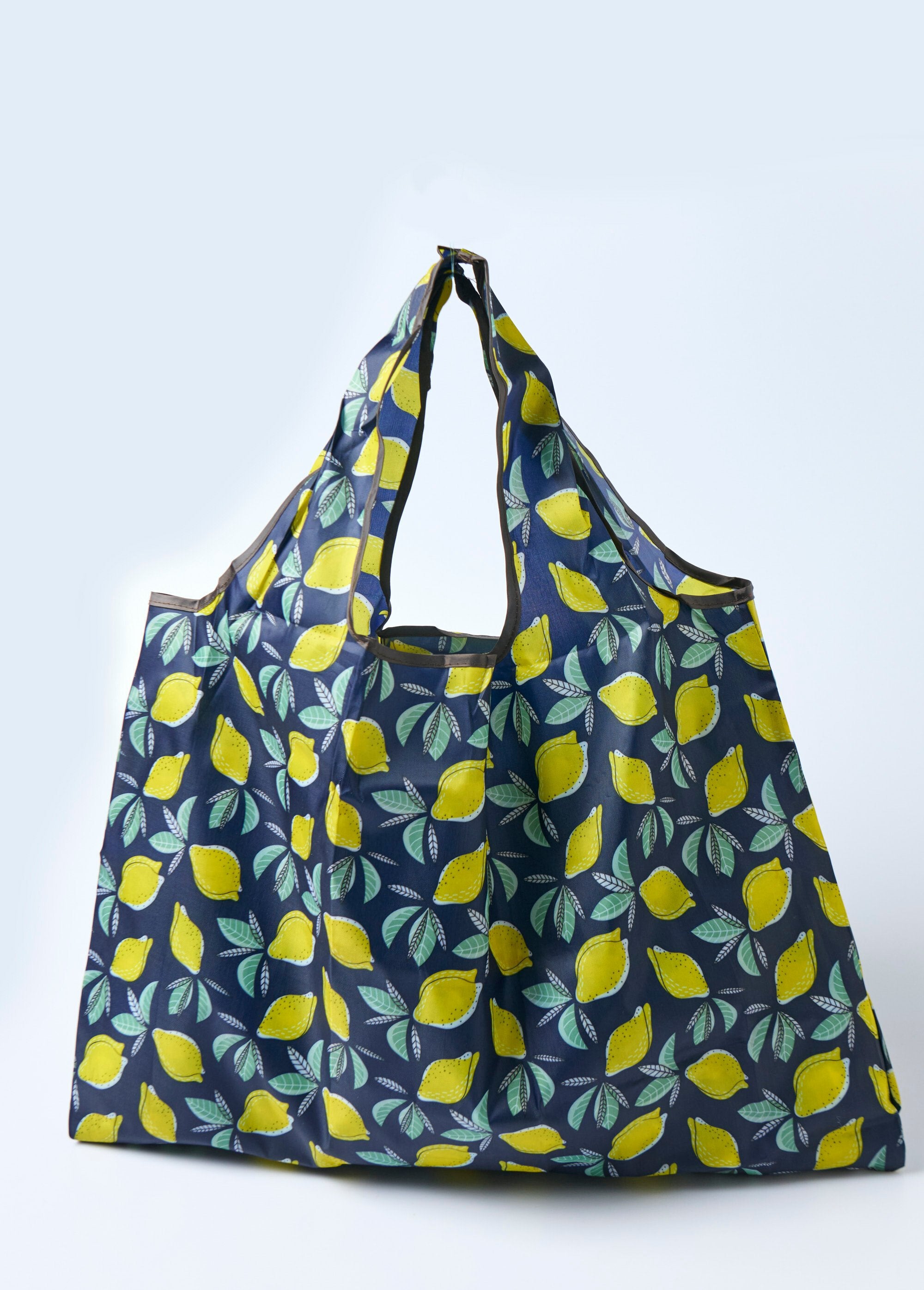 Durable_foldable_shopping_bag,_lemons_Marine_print_yellow_DE1_slim